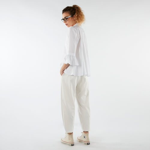 SPODNIE Z ZAKŁADKAMI PRZY KOSTCE