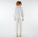 SPODNIE Z ZAKŁADKAMI PRZY KOSTCE