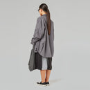 CAMICIA CON DETTAGLIO RIPIEGATO SUL POLSO