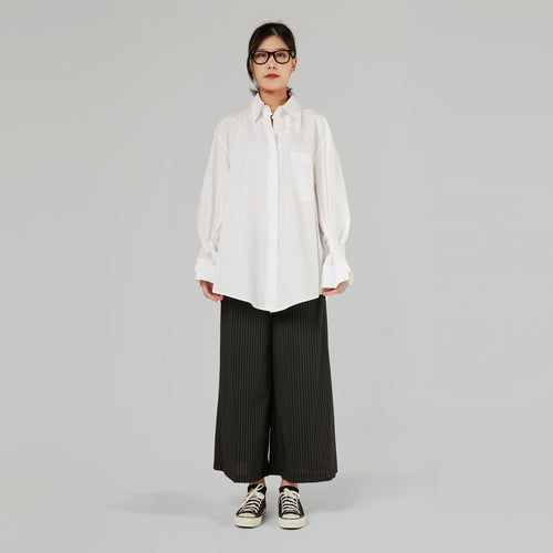 CAMICIA CON DETTAGLIO RIPIEGATO SUL POLSO