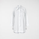 CAMISA CON ACCESORIOS EN EL CUELLO