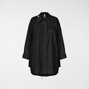 CAMISA CON ACCESORIOS EN EL CUELLO