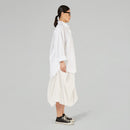 CAMISA CON ACCESORIOS EN EL CUELLO