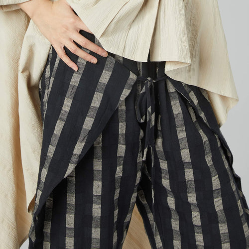 CHECKED TROUSERS WITH WALLET CLOSURE