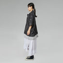 BLACK AND WHITE OVERSIZED BLOUSE