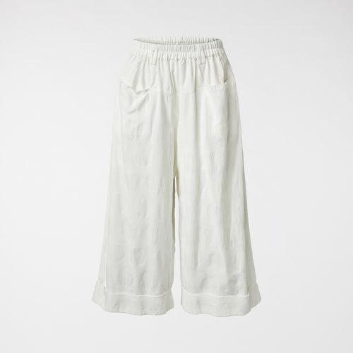 Pantalon à pois en coton blanc
