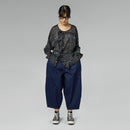 BLUSA SEMI-TRASPARENTE CON ROUCHE NERA