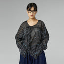 BLUSA SEMI-TRASPARENTE CON ROUCHE NERA