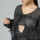 BLUSA SEMI-TRASPARENTE CON ROUCHE NERA