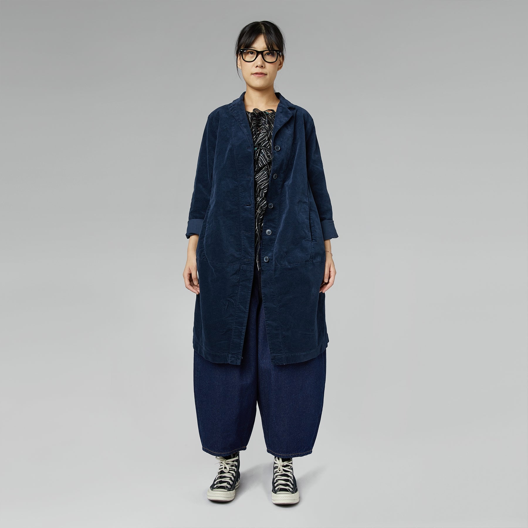 BLUSA SEMI-TRASPARENTE CON ROUCHE NERA