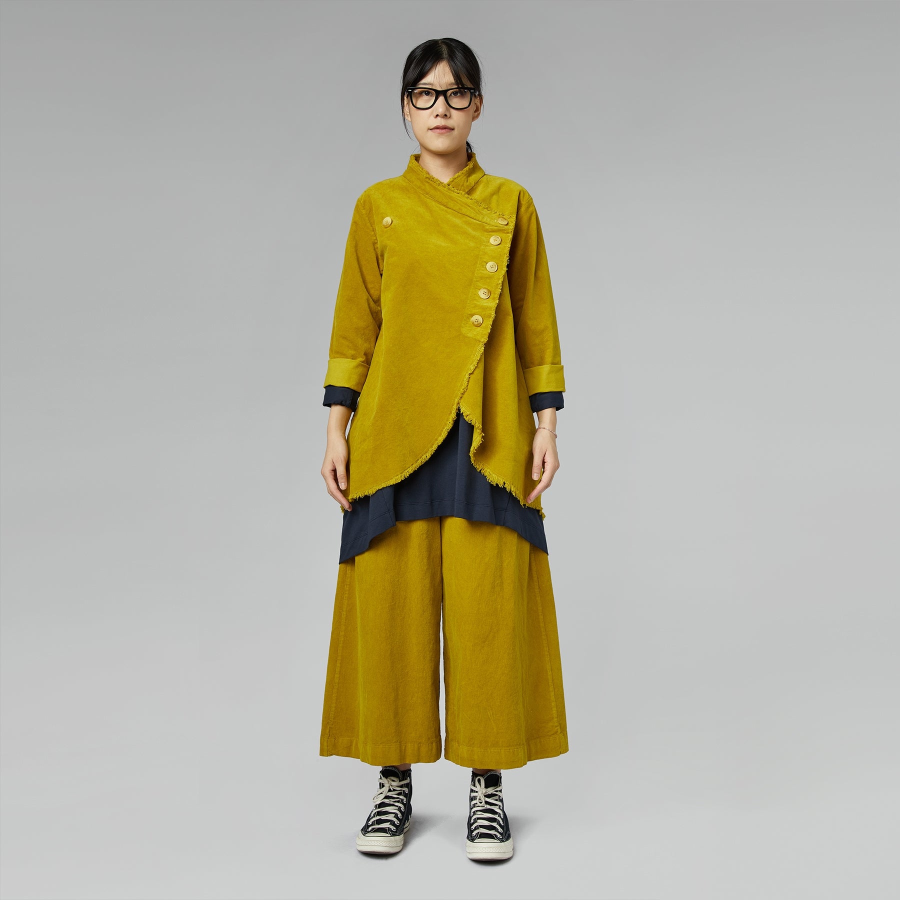 PANTALONES DE PIERNA ANCHA EN TERCIOPELO MOSTAZA