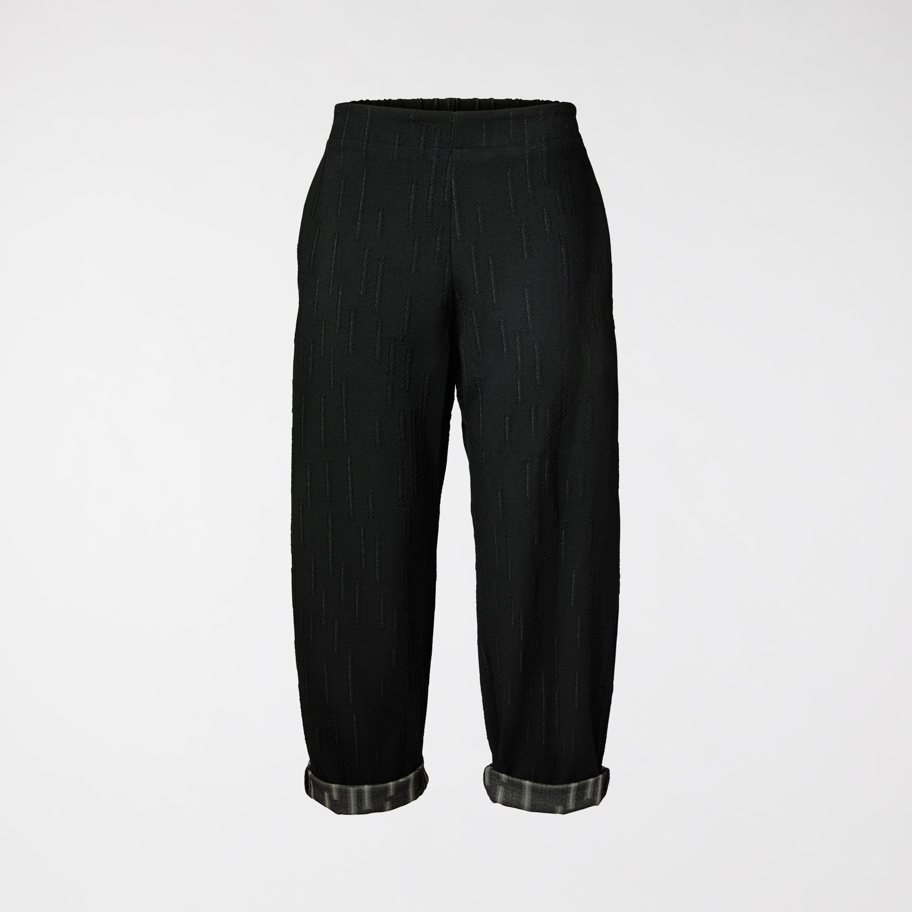 PANTS WITH EMBOSSED HATCHING