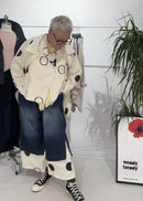 JEANS CON ORLO A POIS