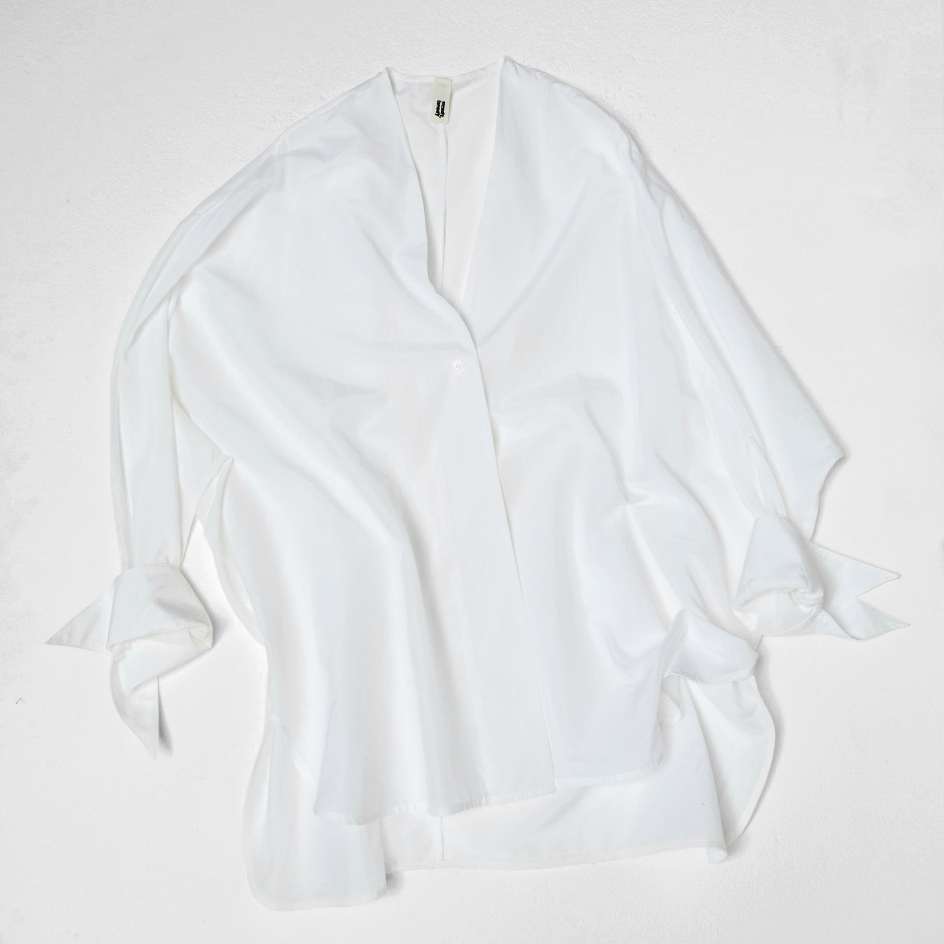 CAMICIA SEMI-TRASPARENTE SCOLLO A V BIANCA